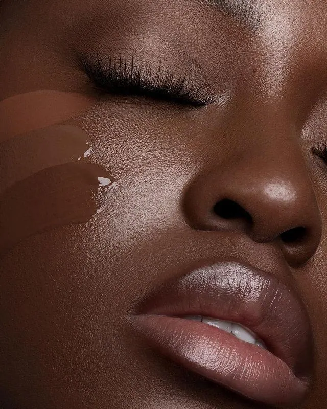 Close-up beauty look with soft lashes and luminous makeup